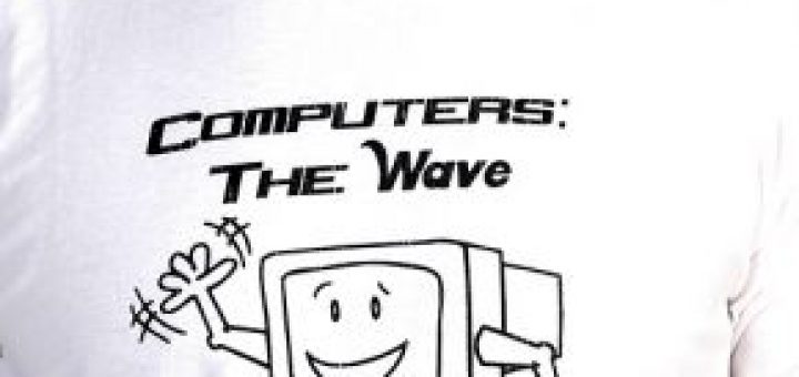 A t-shirt that says "Computers: The Wave of the Future", with smiling, waving anthropomorthic monitor, in a product photo featuring a model from the neck down wearing the t-shirt